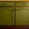 old green vintage kitchen cupboard close up, antique retro desing of closet doors background tecxture stylish