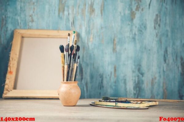 paint brushes on the desk on abstract background