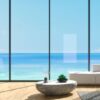 panoramic window villa with blue sea views