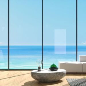 panoramic window villa with blue sea views