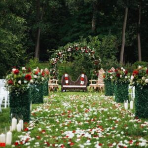 rose petals cover green garden ready for traditional hindu weddi