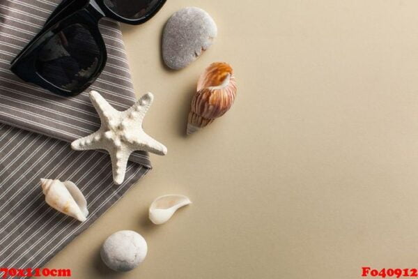 tropical background. flatlay with starfish, sunglasses on a colored background. the concept of travel, sea. copy space