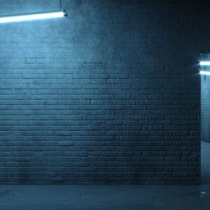 brick wall of a street facade at night