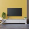 living room led tv on yellow wall with armchair and cabinet tv on yellow wall background.