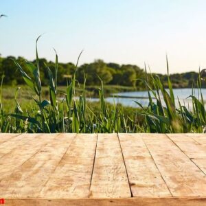 mockup. empty wooden deck table with foliage bokeh background.