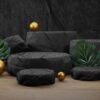 natural stone podium with tropical leaves. backdrop for product