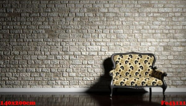 retro sofa on the background of an old brick wall