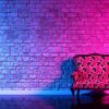 retro sofa on the background of an old brick wall in the enon li