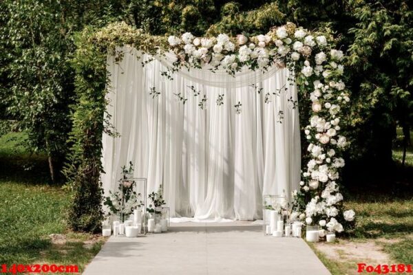 wedding ceremony arch decor with white roses and green outside