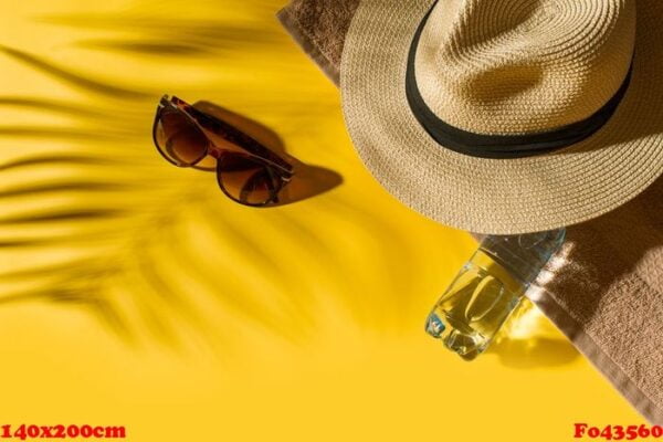 hat and glasses on bright yellow background with bottle of water