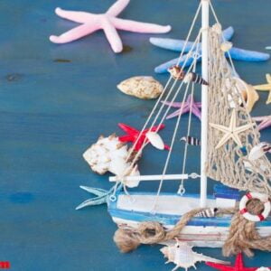 seashells, starfish and boat with copy space