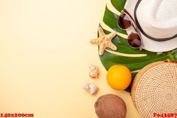 summer vacation banner. rattan bag, sunglasses, hat and exotic fruits on yellow background. travel concept. flat lay. copy space