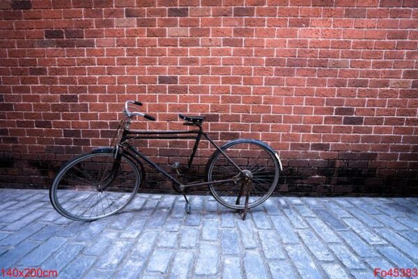 antique bike with red brick background. vintage concept