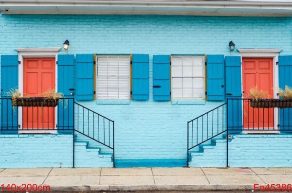 beautiful color scheme of staircases leading to apartments with similar doors and windows