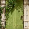 vertical shot of a unique design of a wooden green door