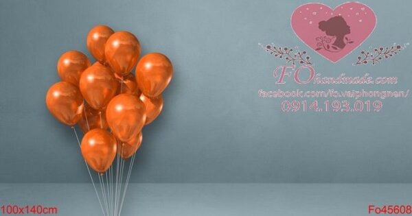 orange balloons bunch on a grey wall background. horizontal banner.