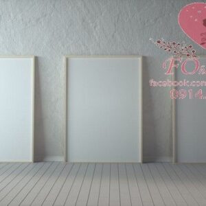 three vertical wooden frame poster on wooden floor with white wall. 3 frame mock up. 3d illustration