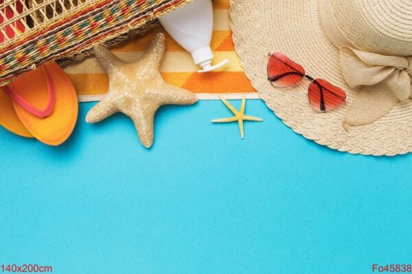 beach accessories and decorative starfish on a blue background w