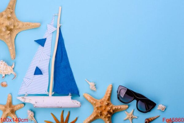 beach accessories: glasses and hat with shells and sea stars on a colored background