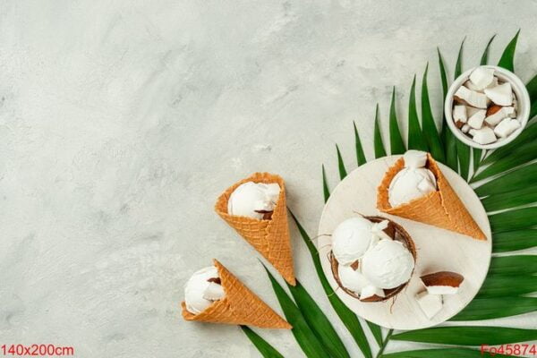 coconut ice cream waffle cones on grey background. flat lay, copy space