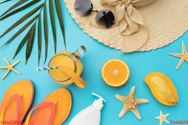 flat composition with beach holiday accessories and fruits on bl