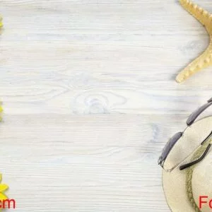 hat, sunglasses and starfish with frame for text. vacation concept. top view