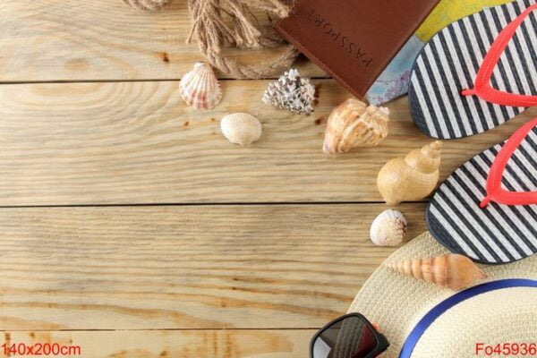 travel concept hat, glasses, flip flops and shells on a natural wooden table. relaxation. holidays. top view. free space