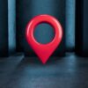 3 d red location symbol. map pointer icon on a dark blue background. 3 d illustration.