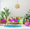 living room design with magenta and blue color.plant on background.rattan sofa and armchair.3d rendering