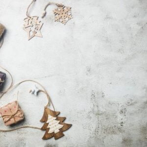 christmas composition with gifts, wooden accessories and decor