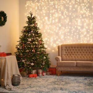 christmas living room with a christmas tree and presents under it