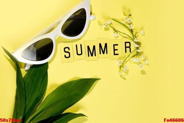 sunglasses on yellow background.