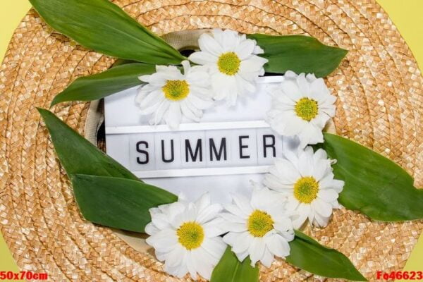 womens summer straw hat on yellow background top view flat lay copy space. summer travel vacation concept, single item. text summer from letters and field chamomiles flowers on yellow background