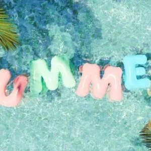 swim float with word summer floating on swimming pool