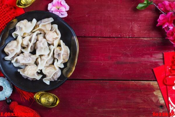 chinese jiaozi new year food, spring festival food on traditiona