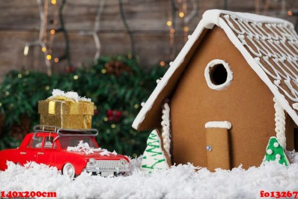 gingerbread house and toy car arranged together