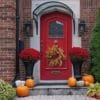 front,door,of,house,decorated,with,fall,wreath,and,pumpkins