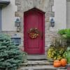 front,door,with,pumpkins,and,halloweeen,decorations