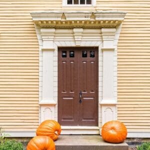 an,old,colonial,era,antique,front,door,to,a,period