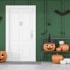 carved,pumpkins,,bats,and,spiders,near,white,front,door,of