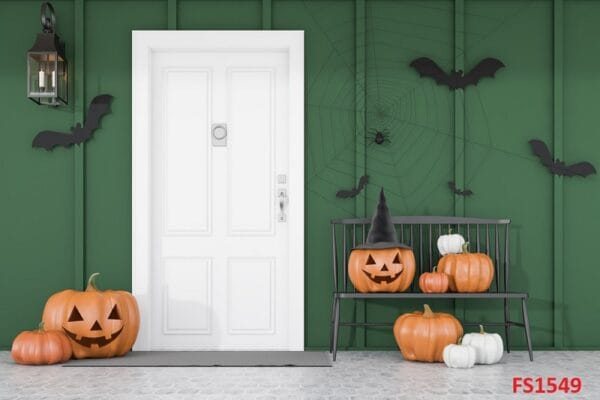 carved,pumpkins,,bats,and,spiders,near,white,front,door,of