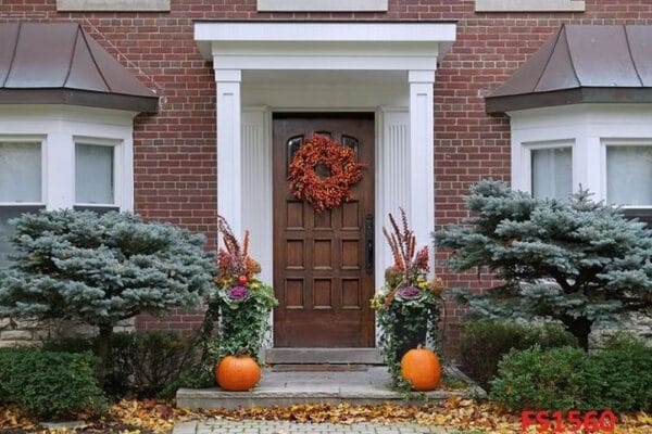 front,door,with,colorful,fall,wreath,and,pumpkins