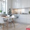 modern kitchen with white cabinets and christmas tree decorated for the holidays