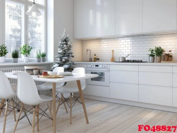 modern kitchen with white cabinets and christmas tree decorated for the holidays