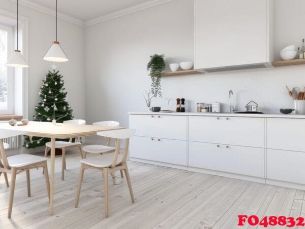 modern kitchen with white cabinets and christmas tree decorated for the holidays