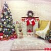 backdrop interior room decorated in christmas style with christmas tree and gift boxes