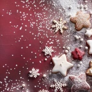 festive christmas cookies and decorations on red background