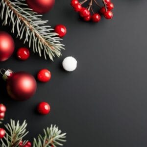 christmas ornaments and pine branch on blue background