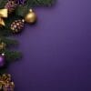 decorative holiday arrangement with pine branches and ornaments against a purple background