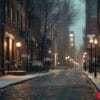 a snowy city street with a few lights on